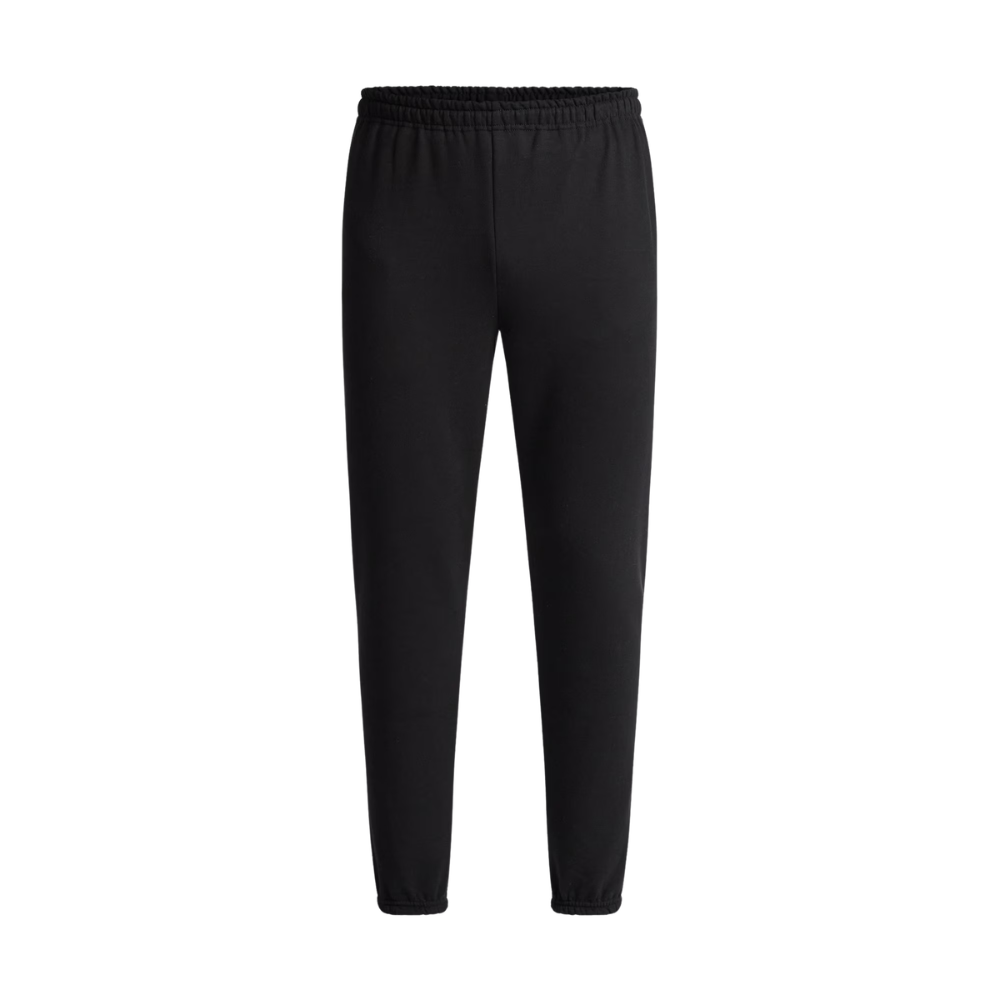 Model wearing men's athletic jogger sweatpants for gym workouts, running, and casual everyday activities.