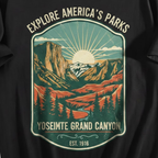 Close-up of the graphic print, cotton fabric texture, and crewneck collar details on men's t-shirt.