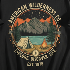 Close-up of the graphic print detail, fabric texture, and crewneck collar on men's short sleeve t-shirt.