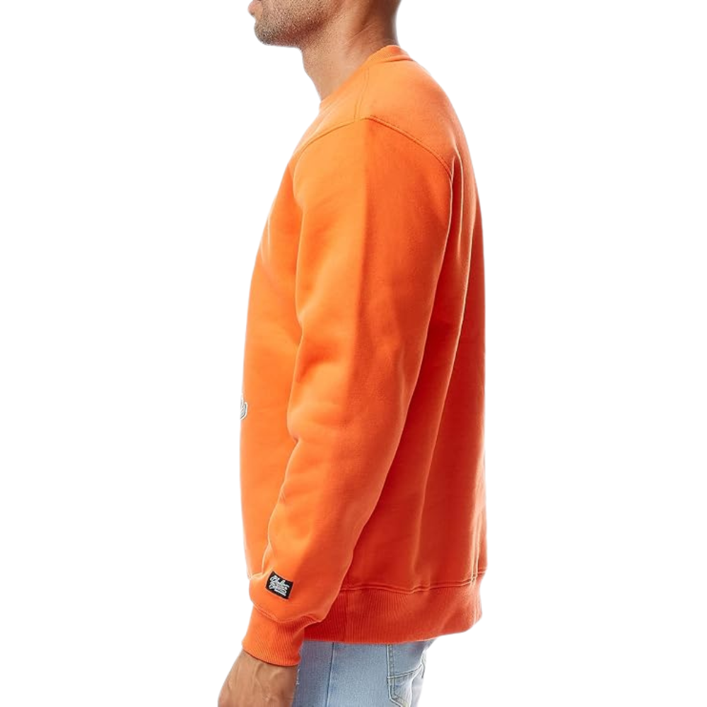 A man wearing a bright orange crewneck sweatshirt, shown in a side profile view against a plain white background.