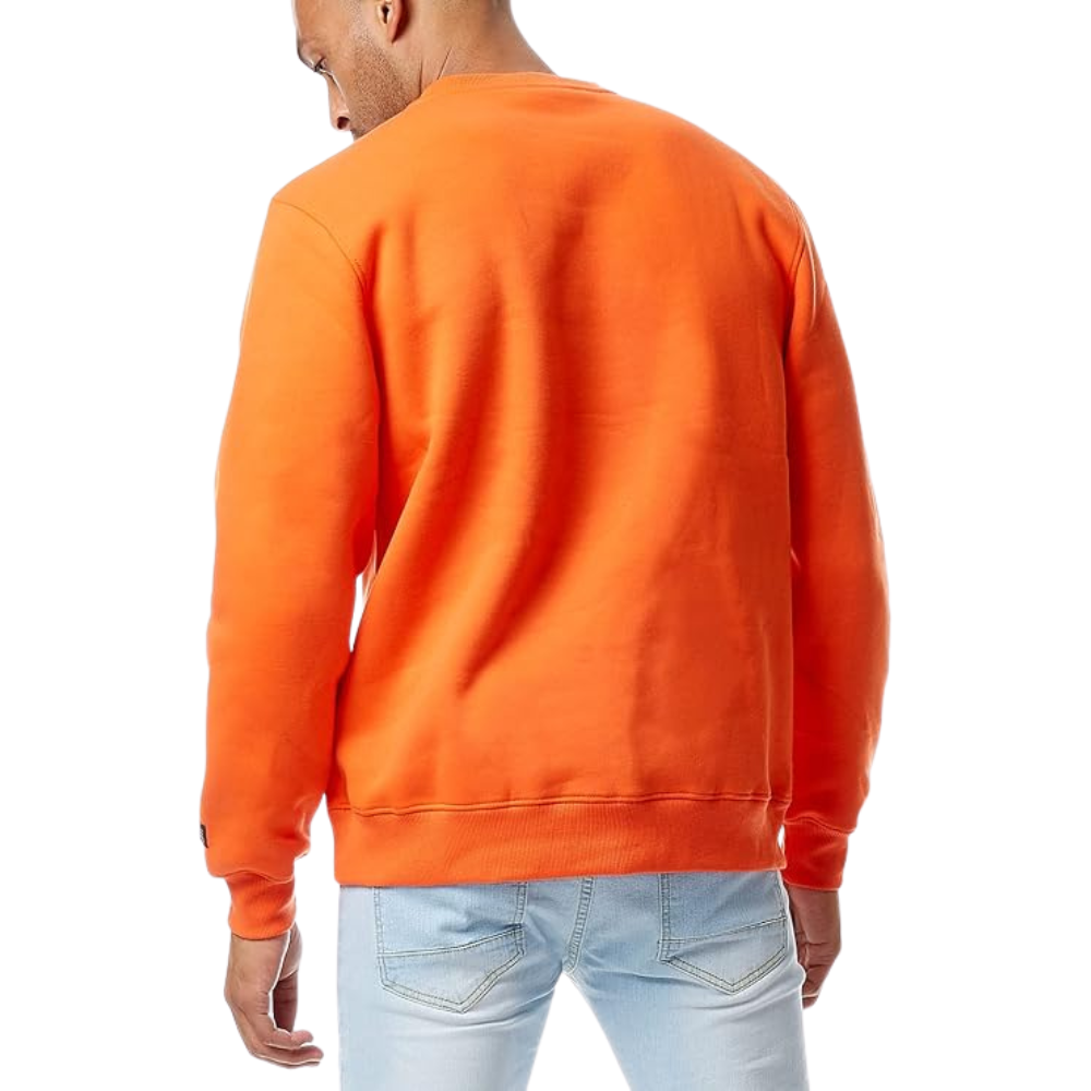 A man wearing a bright orange crewneck sweatshirt, viewed from the back, paired with light blue jeans against a plain white background.