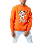 A man wearing a bright orange crewneck sweatshirt with a cartoon bear graphic and 'Super Bear' text, paired with light-wash distressed jeans, against a plain white background.